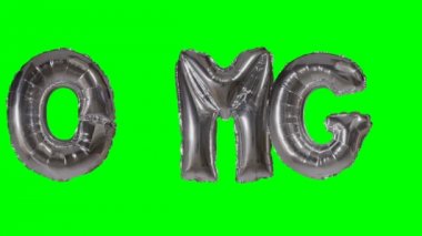 Word Omg gümüş helyum balon harfler yeşil ekran üzerinde yüzen üzerinden