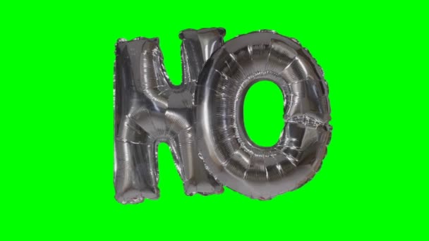 Word no from helium silver balloon letters floating on green screen — Stock Video