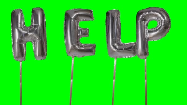 Word aiuto da elio lettere palloncino d'argento galleggianti sullo schermo verde — Video Stock