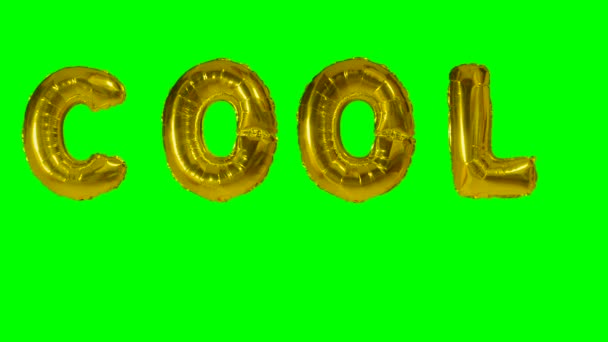 Yeşil ekran üzerinde yüzen altın helyum balon harfler kelime serin — Stok video