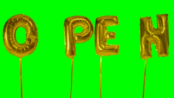 Word open from helium golden balloon letters floating on green screen — Stock Video