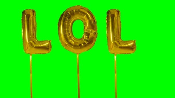 Palabra lol de helio letras globo de oro flotando en la pantalla verde — Vídeos de Stock