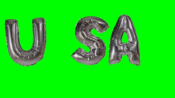 Word USA from helium silver balloon letters floating on green screen — Stock Video