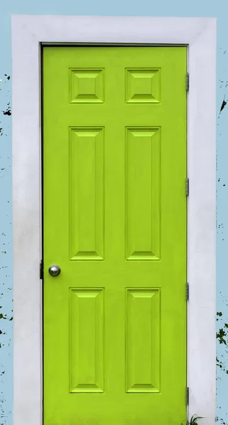 Front view of rustic wooden green door