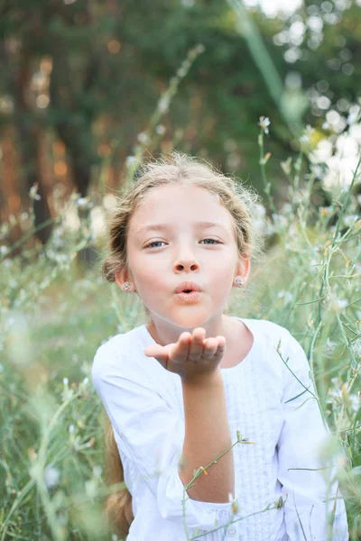 Portrait Cute Little Girl Sends Air Kiss Nature Flowers — Stock Photo, Image