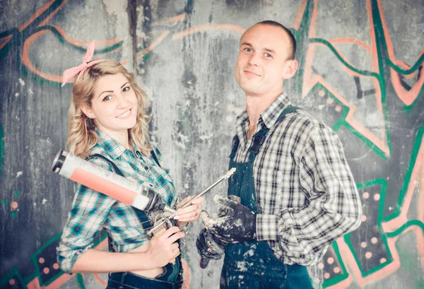 Portrait Young Man Woman Overalls Tools Repair Interior Hands Concept — Stock Photo, Image