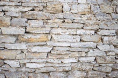 Taş bir duvarın dokusu. Eski taş duvar dokusu arkaplanı.