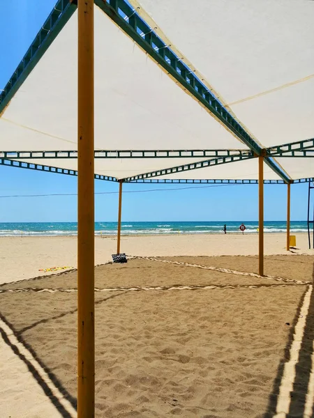 Canopy from the sun on a sandy beach — Stock Photo, Image