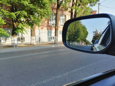 side mirror of vehicles, reflection and road clipart