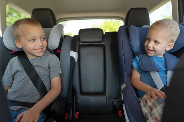 Two Boys Driving Car Seats Safety Children While Traveling Car — Stock Photo, Image