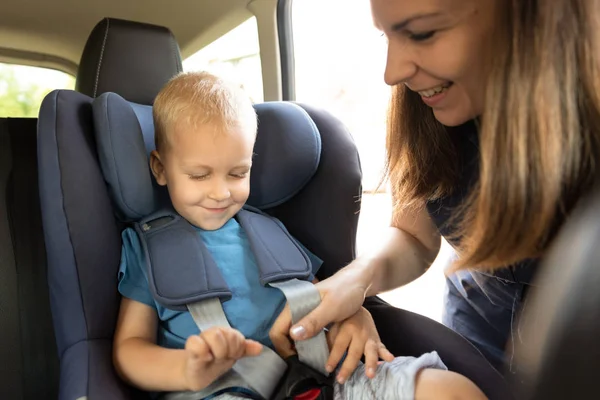 Boy Buckled Car Seat Mother Takes Care Child Car — Stock Photo, Image