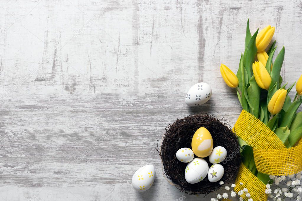 Easter eggs and flowers background
