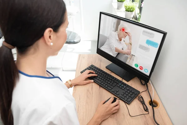 Doctor and senior woman patient, telehealth — Stock Photo, Image