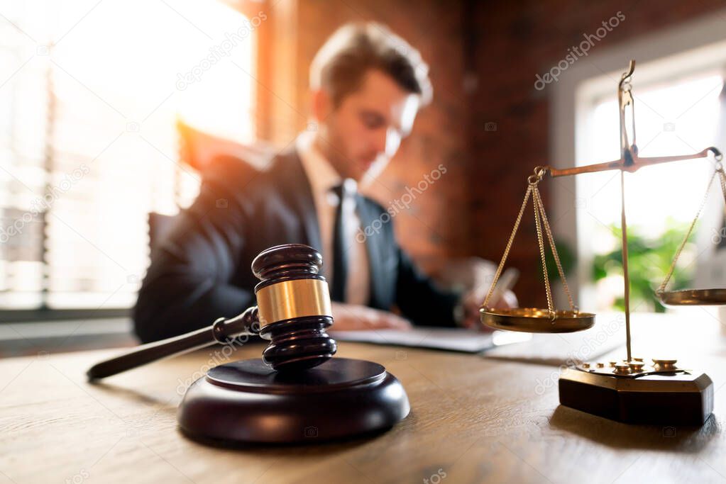 Lawyer working in office. Law and justice concept