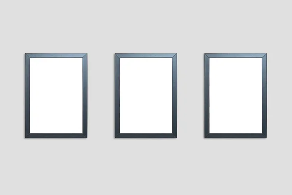 Blank photo frames on the wall. Black rectangular mockup frames for your presentation