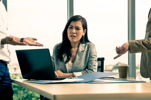 Managing Director and Manager Claiming to Businesswoman At Office; Business stress concept