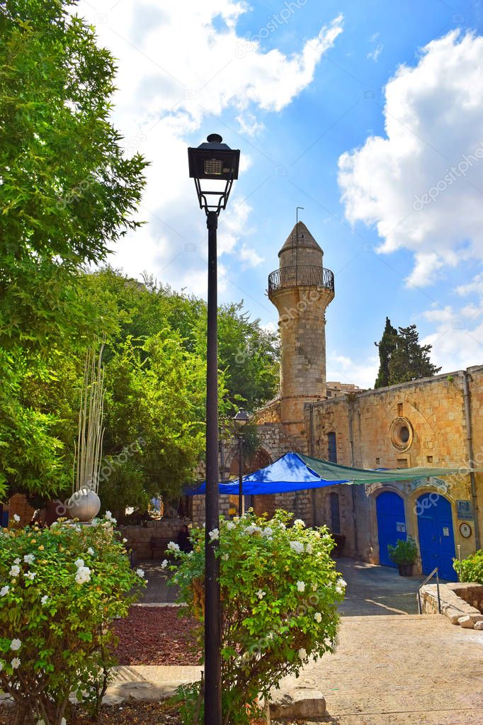 minoret of old turkish mosque, walk through the Old Town of Safed, center of Kabbalah and jewish mysticism in Upper Galilee, Israel