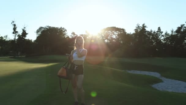 Sporty Woman Holding Smartphone Headphones Walking Park — Stock Video