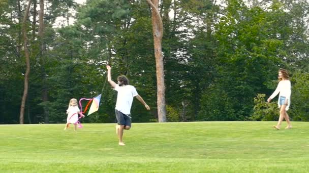 Family Having Fun Outdoors Father Running Kite Summer Time Slowmotion — Stock Video