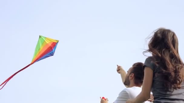 Young Happy Couple Having Fun Playing Flying Kite — Stock Video