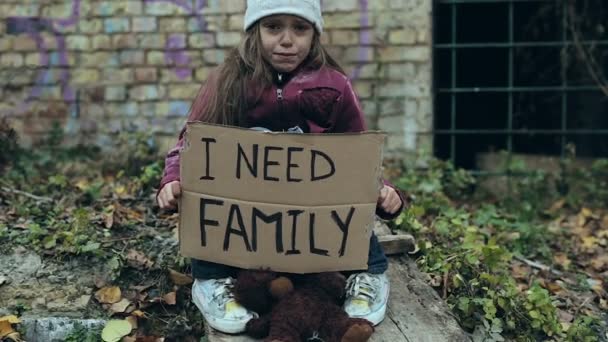 Crying Homeless Girl Sitting Board Debris Holding Cardboard Sign Need — Stock Video