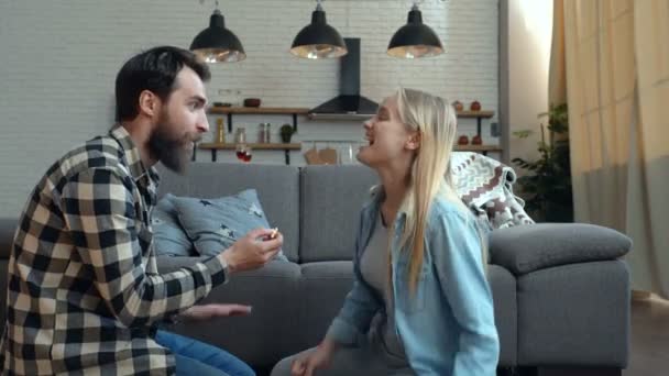 Happy Couple Joking Having Fun Home Sitting Floor Sofa Guy — Stock Video