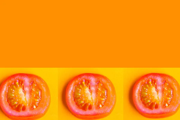 オレンジの背景に新鮮なトマトのパターンをスライド ミニマリズムの概念 コピースペース バナー — ストック写真