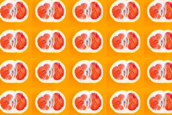 Modello Fette Pompelmo Sfondo Arancione Brillante Concetto Minimale — Foto Stock