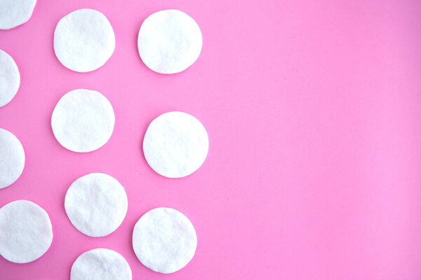 Cotton sponges pattern on pink background, minimal concept, copy space, banner