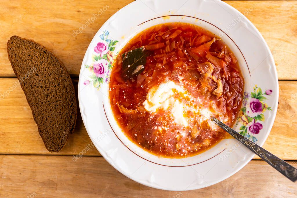 Russian borscht with sour cream, Ukrainian borscht with sour cream, food background