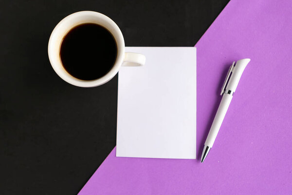 Coffee cup and white mockup blank on geometric purple and black background, top view. Minimal concept