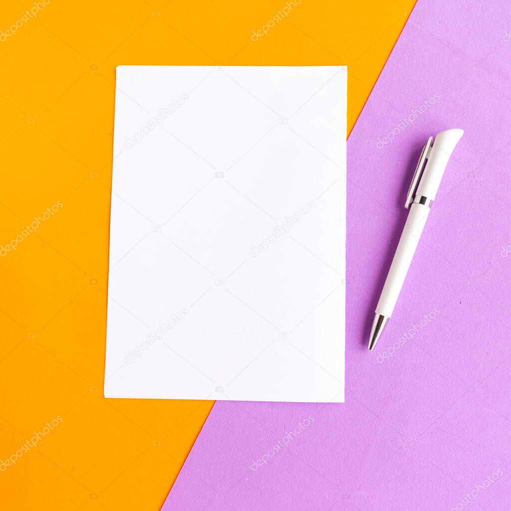 white mockup blank on geometric purple and orange background, top view. Minimal concept