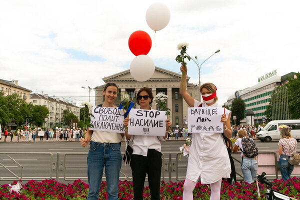 : Peaceful protests in Belarus. Presidential elections in Belarus 2020. Women and flowers in Belarus