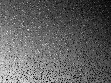 Camın üzerine renkli arka planda su damlacıkları. Su damlaları.