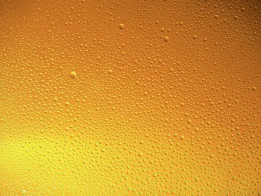 Camın üzerine renkli arka planda su damlacıkları. Su damlaları.