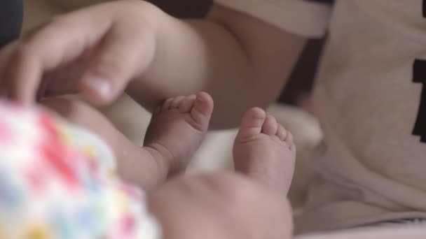 Brother with baby sister at home — Stock Video