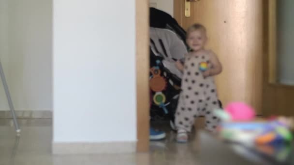 Active and happy baby girl at home — Stock Video