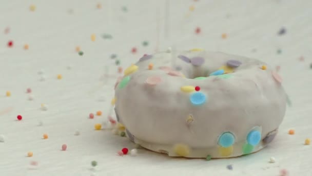 Glazed donut with sugar sprinkles — Stock Video