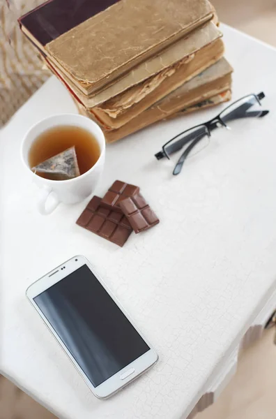 Table Chocolate Books Tea Glasses Phone — Stock Photo, Image