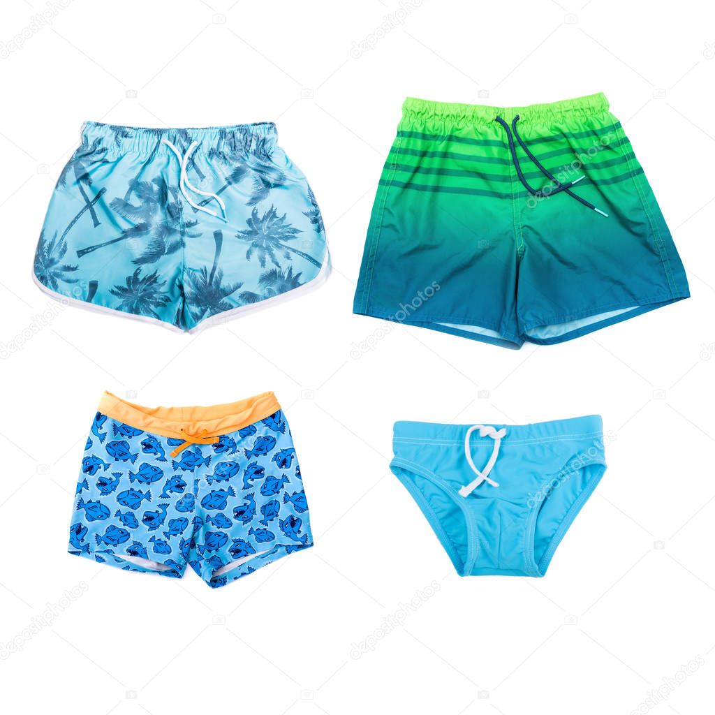 Collage of different shorts for boys on white background.