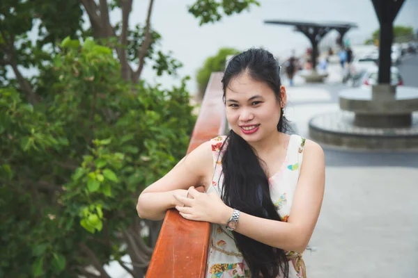 Close Portrait Asian Woman Sweet Beige Dress Sitting Next Bridge Stock Photo