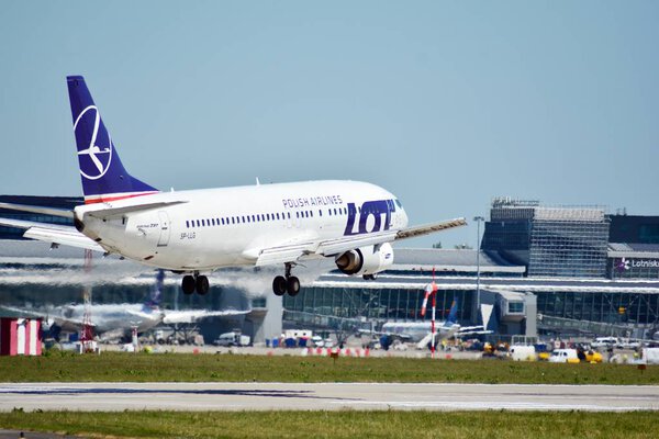 Warsaw, Poland. 8 June 2018. Plane LOT - Polish Airlines Boeing 737 just before landing at the Chopin airport.