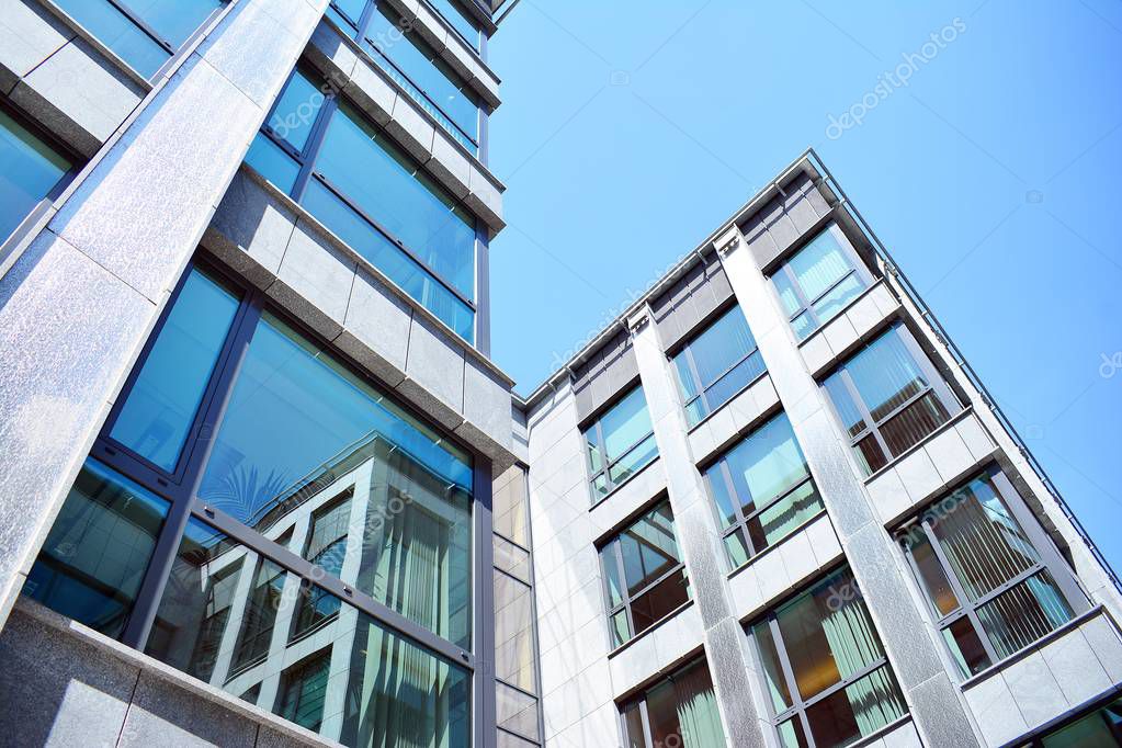Urban abstract background, detail of modern glass facade, office business building