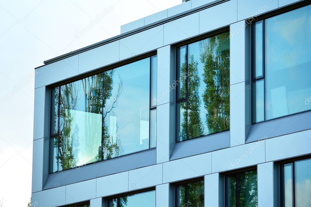 Urban abstract background, detail of modern glass facade, office business building