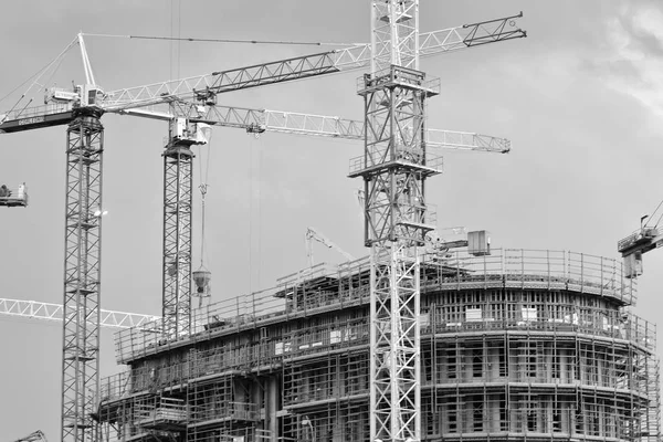 Building under construction. Construction site. Black and white