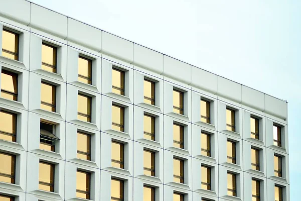 Brown windows of the building. Geometric background. Building\'s facade