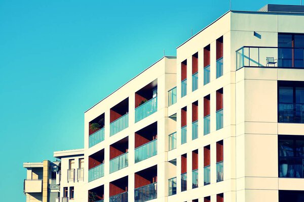 Modern apartment building exterior. Retro colors stylization