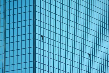 Çağdaş mimarinin, beton ve camdan duvarlar soyut parçası. Cam giydirme cephe modern ofis binası