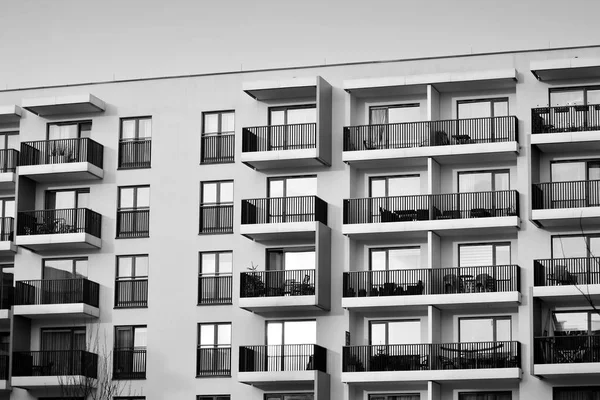 Modern European residential apartment building. Black and white.