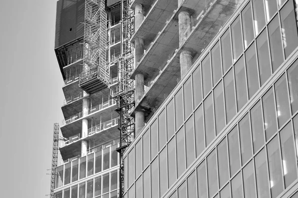 Detail view of skyscraper construction. Black and white.